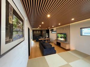 Televisyen dan/atau pusat hiburan di Ume no Yu Takenoya - Vacation STAY 40917v