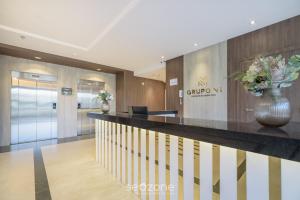 Η κουζίνα ή μικρή κουζίνα στο MHFs - Apts Variados em Prédio com Vista para o Mar em Itapema