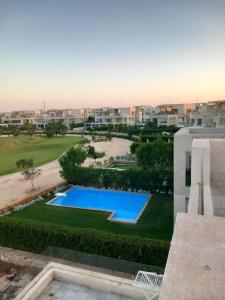 Bazén v ubytování The dream villa for an happy family vacation at Hacienda Bay Sahel nebo v jeho okolí