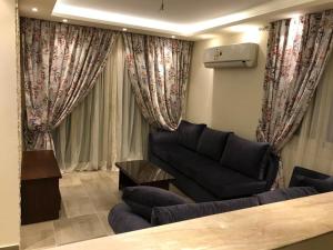 Posezení v ubytování The dream villa for an happy family vacation at Hacienda Bay Sahel