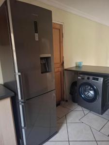 Kuchyň nebo kuchyňský kout v ubytování Sea Breeze Valley 2