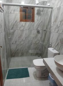 Koupelna v ubytování Casa sol nascente hospedagem bichinho MG