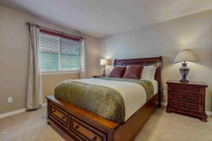 a bedroom with a large bed and a window at Bondgard Hideaway in Enumclaw +18 photos