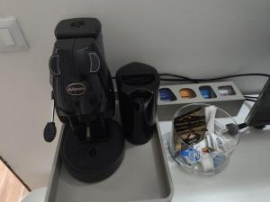 a gaming system sitting on top of a table at Girasole Casa Vacanza in Stradella +1 photo