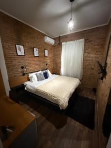 Postel nebo postele na pokoji v ubytování Hotel Germânico