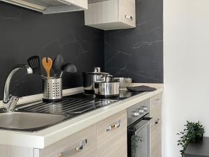 Η κουζίνα ή μικρή κουζίνα στο Appartamento Gran Sasso MINI Relax +10 φωτογραφίες