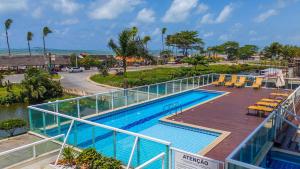 Bazén v ubytování Férias na Praia - 2 Quartos em Cond Premium nebo v jeho okolí