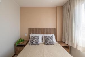 Postel nebo postele na pokoji v ubytování Férias na Praia - 2 Quartos em Cond Premium + 21 fotografií