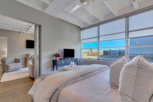 Ένα ή περισσότερα κρεβάτια σε δωμάτιο στο Urban Loft by Lucky Savannah