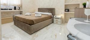 Ένα ή περισσότερα κρεβάτια σε δωμάτιο στο Luxury Apartments By Anna