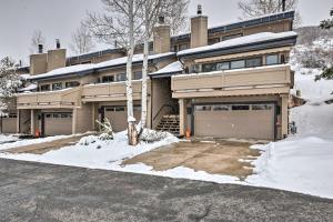 a house with a garage in the snow at 2 Mi to Park City Mtn Townhome with Balcony in Park City