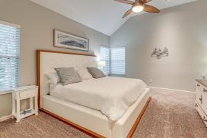 a bedroom with a bed and a ceiling fan at Family Home with Deck 12 Mi to Downtown Nashville! in Nashville