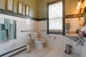 a bathroom with a toilet and a sink at The Presidential Stay, Converted Railcar in DuBois in Adrian Furnace +28 photos