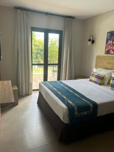 En eller flere senge i et værelse på Quinta Santa Bárbara Eco Resort