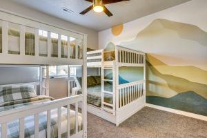 Una cama o camas en una habitación de Room to Work and Relax! SLC Townhome with Office, Yard
