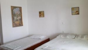 Postel nebo postele na pokoji v ubytování Stone House
