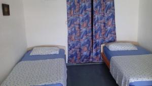 Postel nebo postele na pokoji v ubytování Stone House