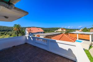 a view from the balcony of a house at Apartment Pavilion in Kampor