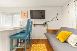 a living room with a couch and a bar at Sea Haven Motel Unit .7 in Rockaway Beach