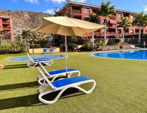 Πισίνα στο ή κοντά στο PALM-MAR Paradise with pools and AC