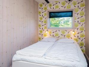Postel nebo postele na pokoji v ubytování 6 person holiday home in Rømø-By Traum