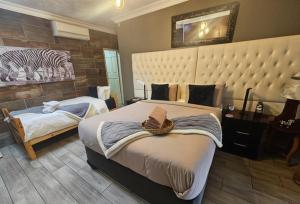 صورة لـ Bosveld In Die Stad Lodge في ألبرتون