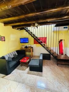 TV a/nebo společenská místnost v ubytování Casa con bajada al Río Potrero de los funes