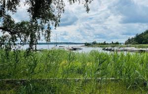 a body of water with boats in the water at Awesome Home In Ingarö With Ethernet Internet in Forsvik