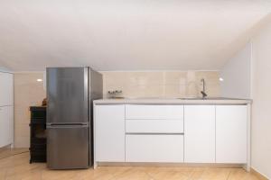 Kuchyň nebo kuchyňský kout v ubytování Seaside secluded apartments Cove Tvrdni Dolac, Hvar - 8703