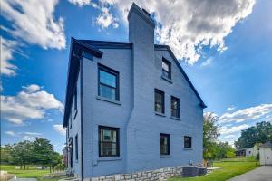 a blue house with a tower on top of it at 3 Mi to Dtwn Updated Home with Hot Tub in Lexington in Lexington
