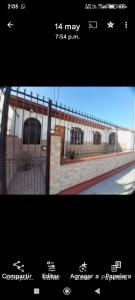 a picture of a fence in front of a building at Arriendo de habitación amobladas centro de la ciudad de la serena chile in La Serena