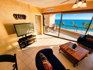 a living room with a view of the ocean at Sonoran Spa E509 in Campo del Medio