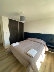 En eller flere senge i et værelse på Departamento Sierras Cordobesas + 7 billeder