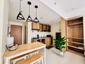 Una cocina o cocineta en The Asher Mactan