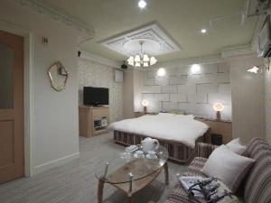 TV a/nebo společenská místnost v ubytování 多治見ホテルロコガーデン