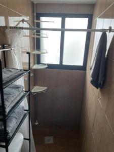 Bilik mandi di Departamento céntrico fácil acceso, 45 amenidades +10 gambar