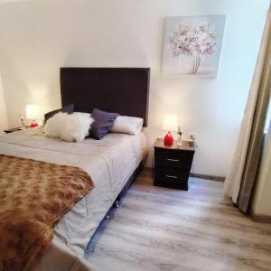 En eller flere senge i et værelse på Torre Vallecito