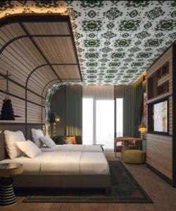 Ένα ή περισσότερα κρεβάτια σε δωμάτιο στο Canopy By Hilton Izmir Bomonti