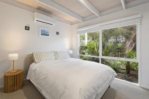 Un pat sau paturi într-o cameră la Scott Street Retreat Blairgowrie