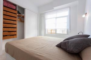Ένα ή περισσότερα κρεβάτια σε δωμάτιο στο Apartamento Miramar