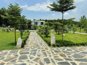 ダナンにあるVượng Phát Villa- Venuestayの背景の石道