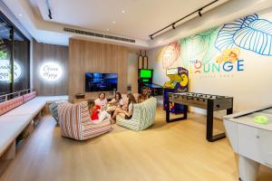 a group of children sitting in chairs in a play room at Anantara Bophut Koh Samui Resort in Bophut +91 photos