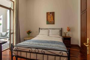 Postel nebo postele na pokoji v ubytování Casetta Stella - Affitti Brevi Italia