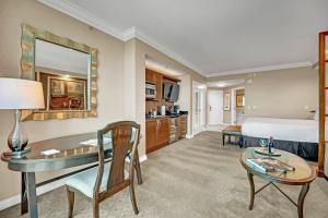 a hotel room with a bed and a desk at Sakura Serenity-View-No Resort Fee in Las Vegas