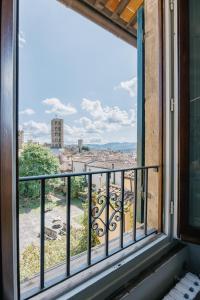 a window with a view of a city at Palace d'Art - Centro Storico di Arezzo in Arezzo
