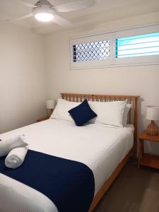Ένα ή περισσότερα κρεβάτια σε δωμάτιο στο Oceanfront Ground Floor Apartment - Dwell 3 in Bargara