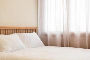 Postel nebo postele na pokoji v ubytování 코지스테이 Cozy stay + 15 fotografií