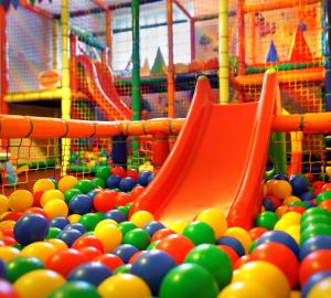 a playground filled with lots of colorful balls at Hotel Aurora Family & SPA in Międzyzdroje