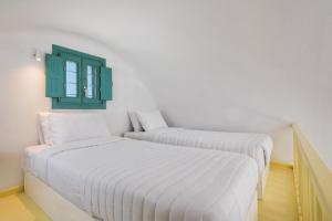 Postel nebo postele na pokoji v ubytování Ananda Retreat