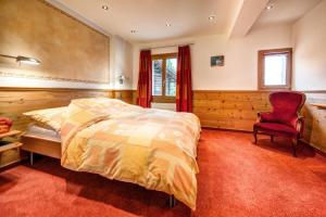 Ένα ή περισσότερα κρεβάτια σε δωμάτιο στο Hotel Gspan
